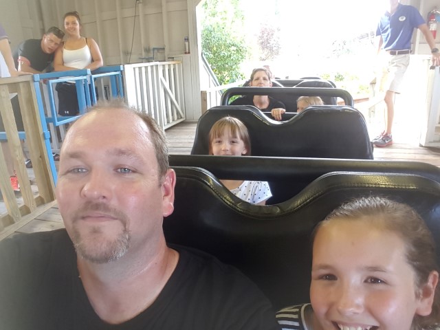 We talked all the girls into riding Timber Terror. Our oldest and yougest weren't too happy during it, but we all survived!